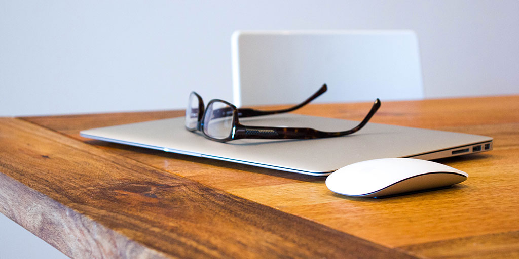 Laptop sitting on a desk 